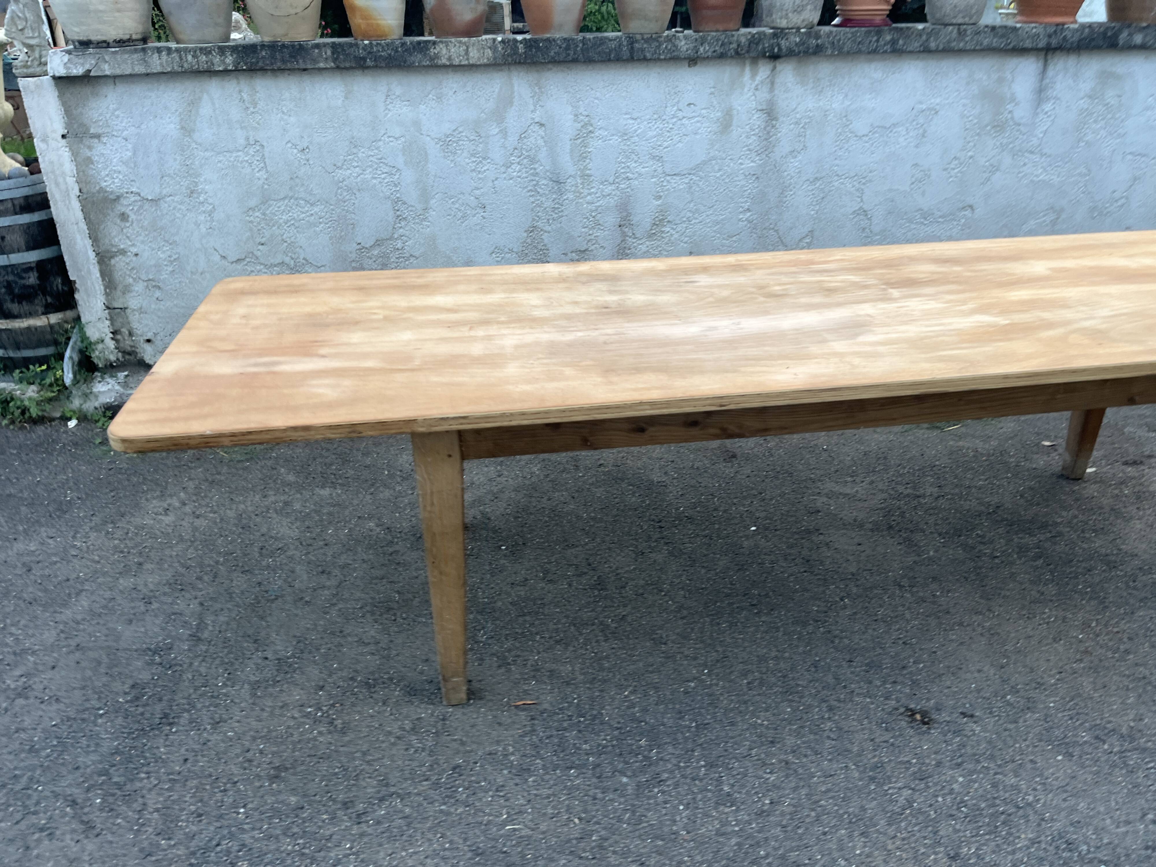 Large table 3 metres, tapered wooden legs, sanded top.