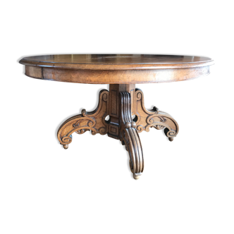 Old oak table with extendable oval central foot