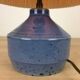 Blue ceramic lamp foot and white wool lampshade