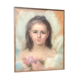 Portrait of a young girl with lilacs
