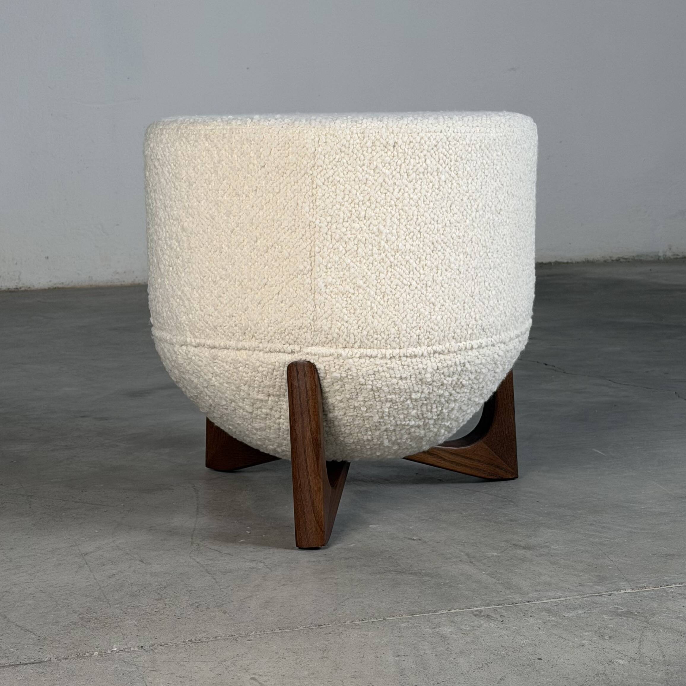 Totemo stool by forme, ivory dedar bouclé upholstery, walnut legs