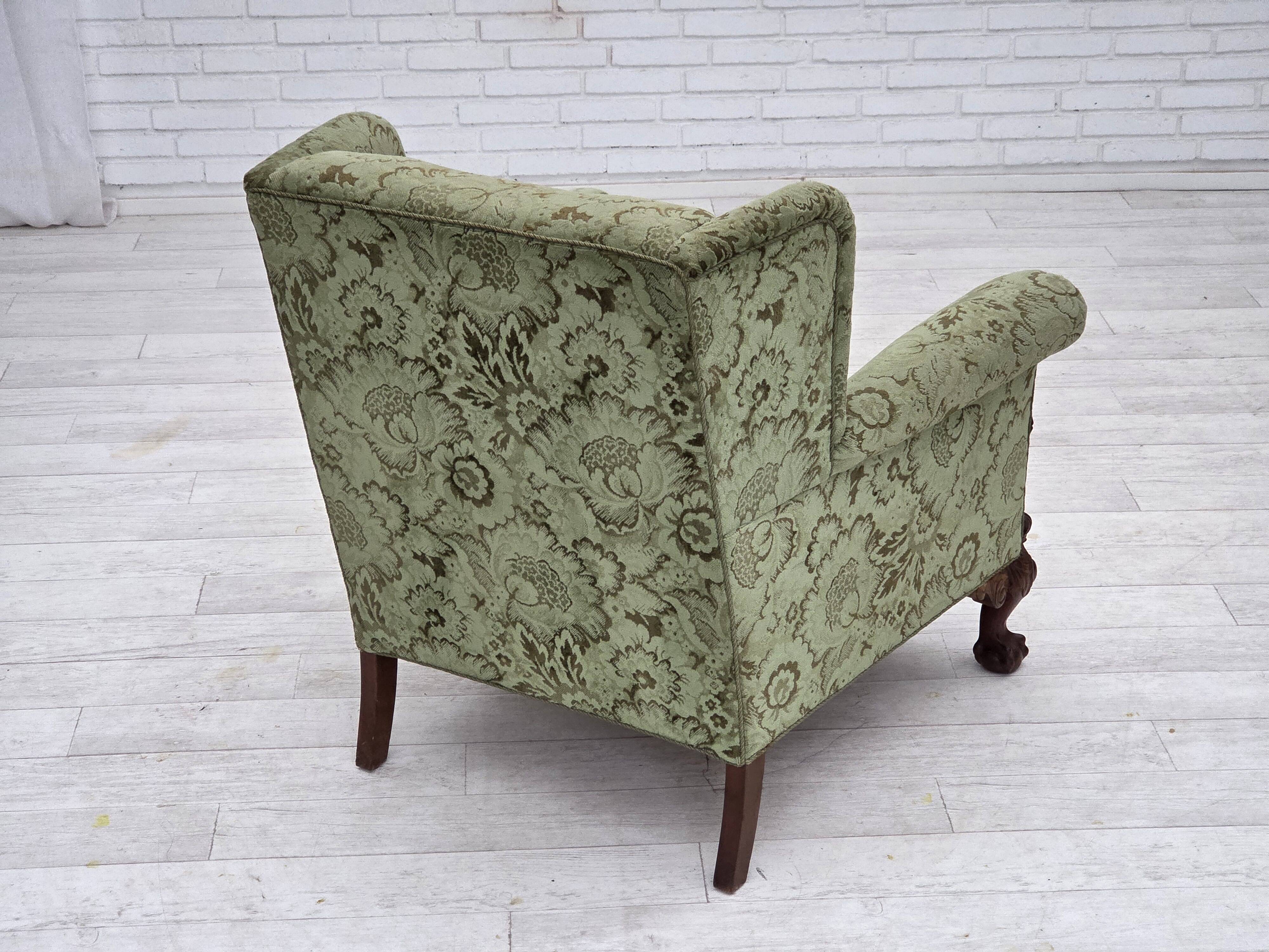 1950s, Danish relax armchair, green furniture velour, carved oak wood.