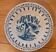 Old enamelled earthenware plate / Blue floral decoration