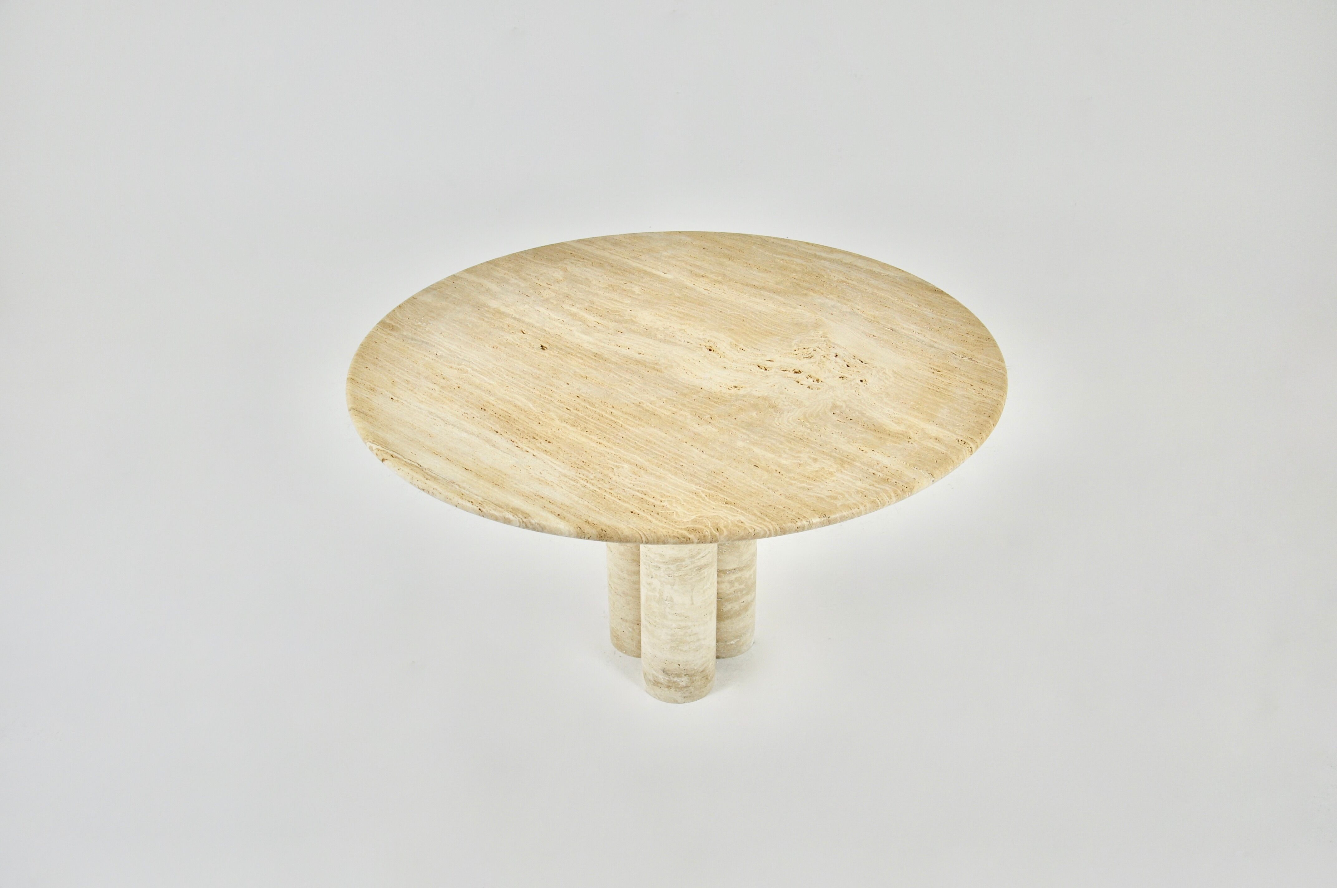 Circular travertine dining table