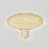 Circular travertine dining table