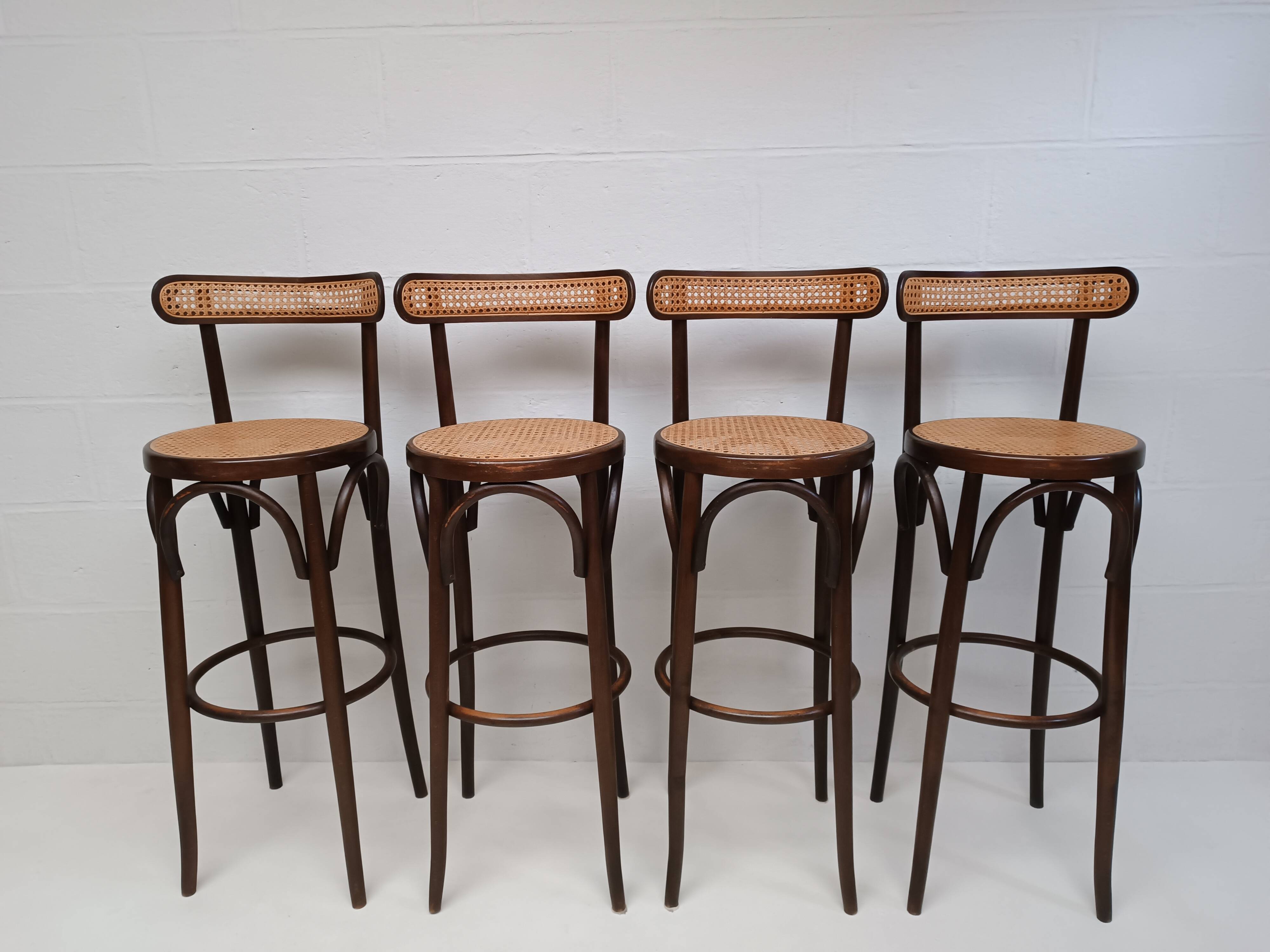 4 curved wood and cane bar stools