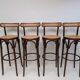 4 curved wood and cane bar stools