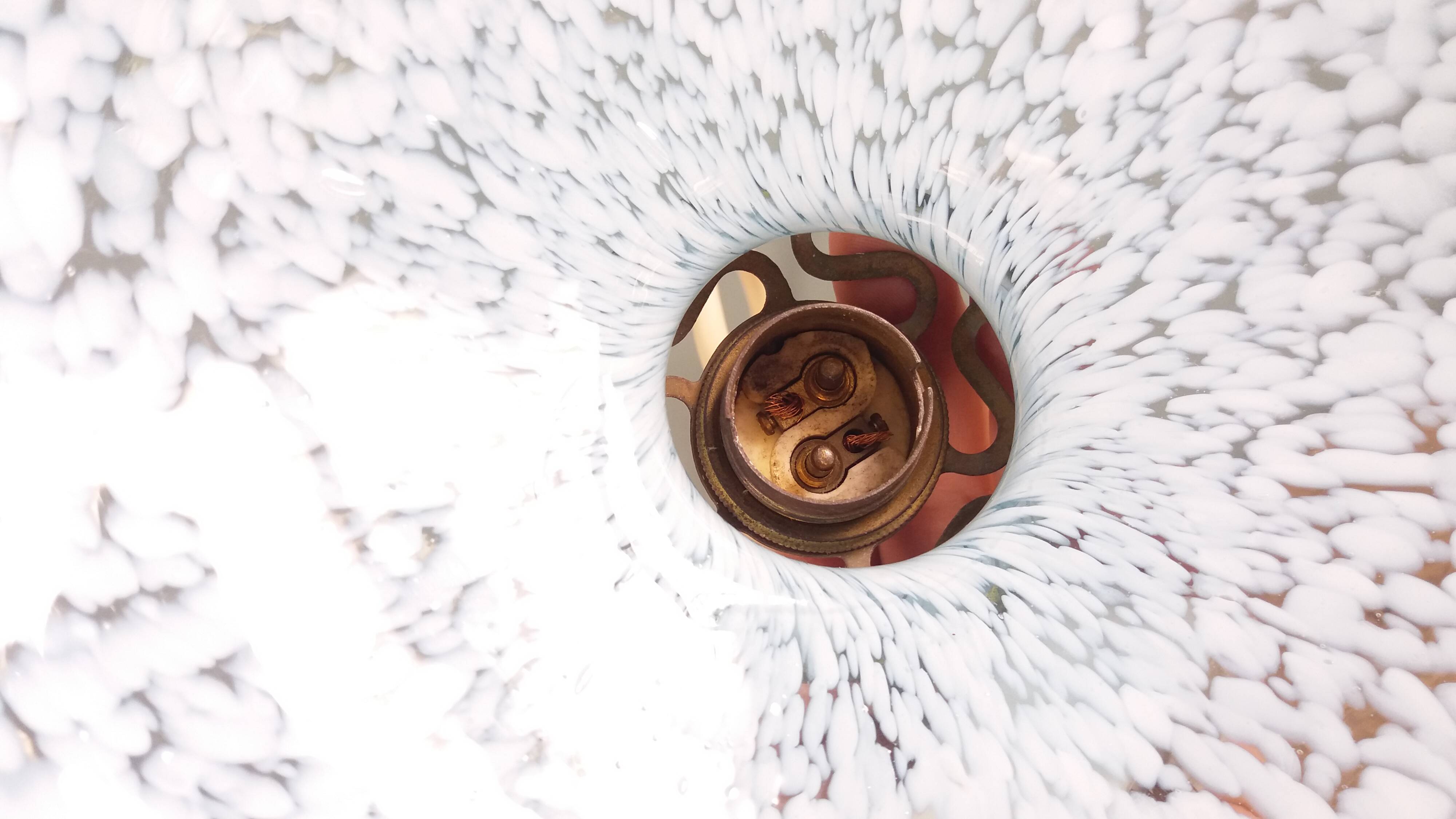 Suspension light with a sky blue glass shade from Clichy, snowflake shape.