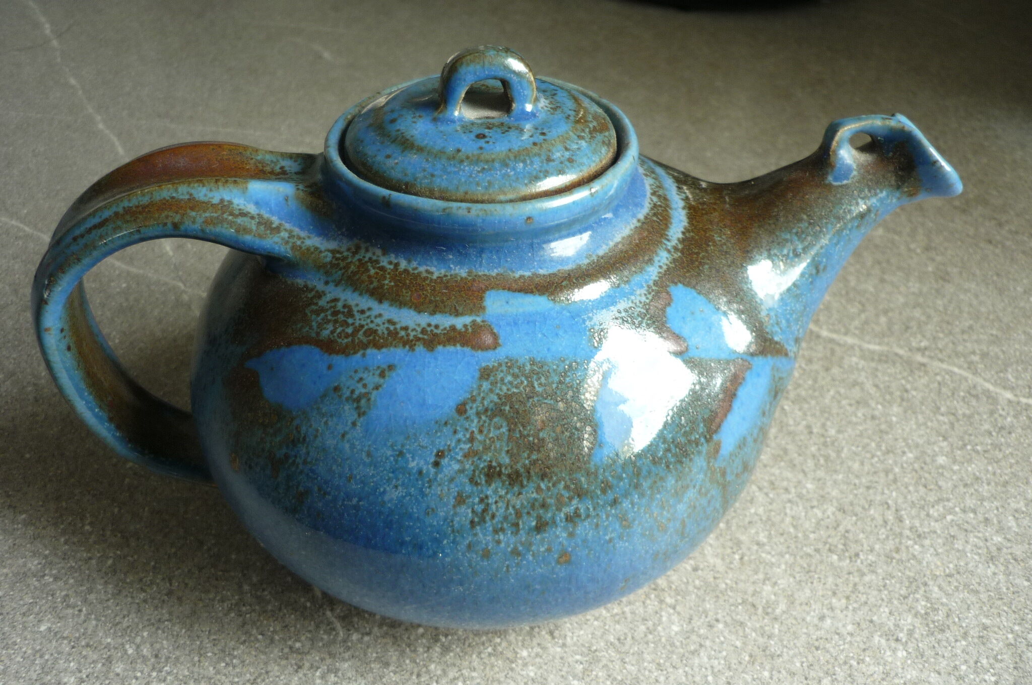 Vernified and flamed sandstone teapot, and its milk pot