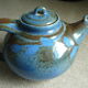 Vernified and flamed sandstone teapot, and its milk pot