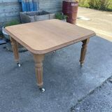 Table carrée en bois brut avec 2 rallonges