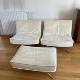 Two armchairs and a pop footstool from Roset