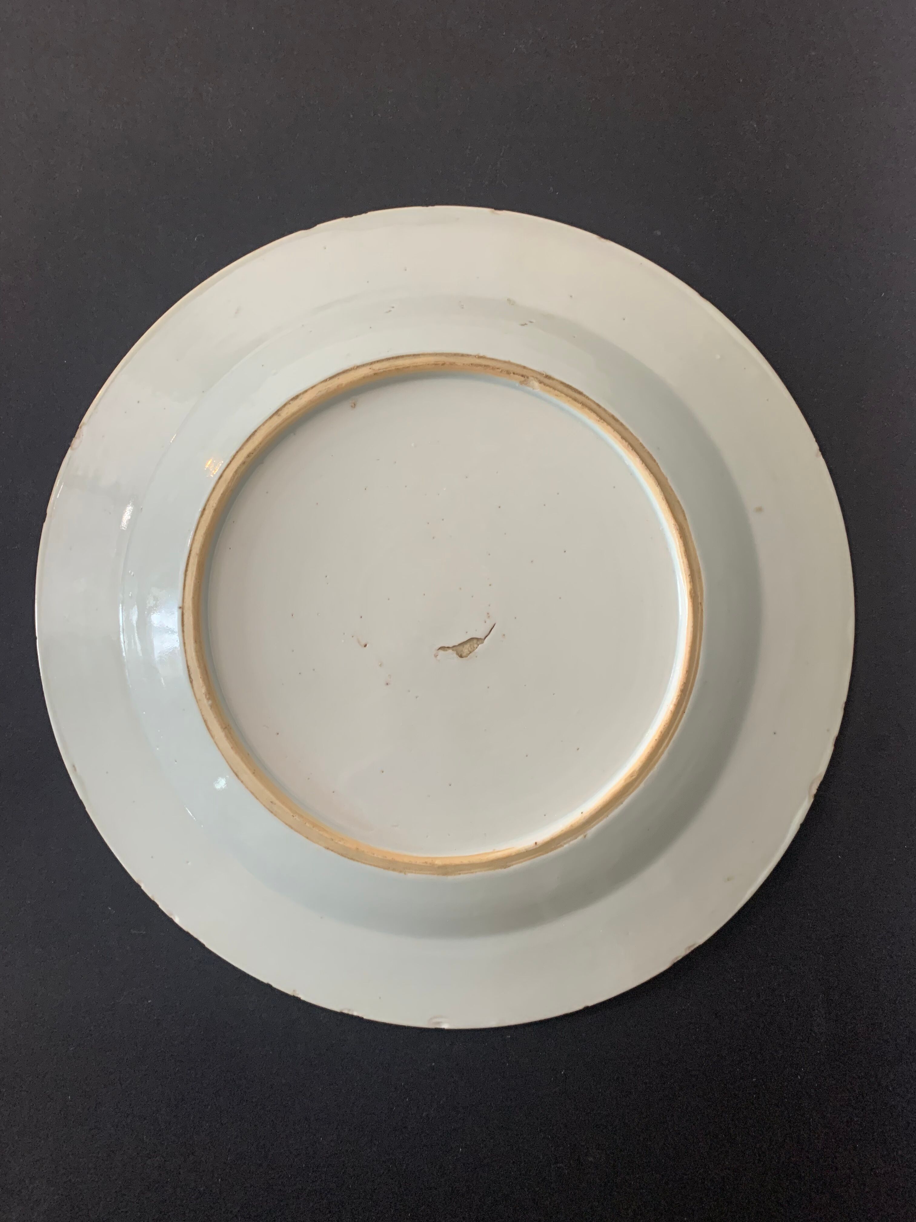 Blue and white porcelain plate of the blue family, 19th century