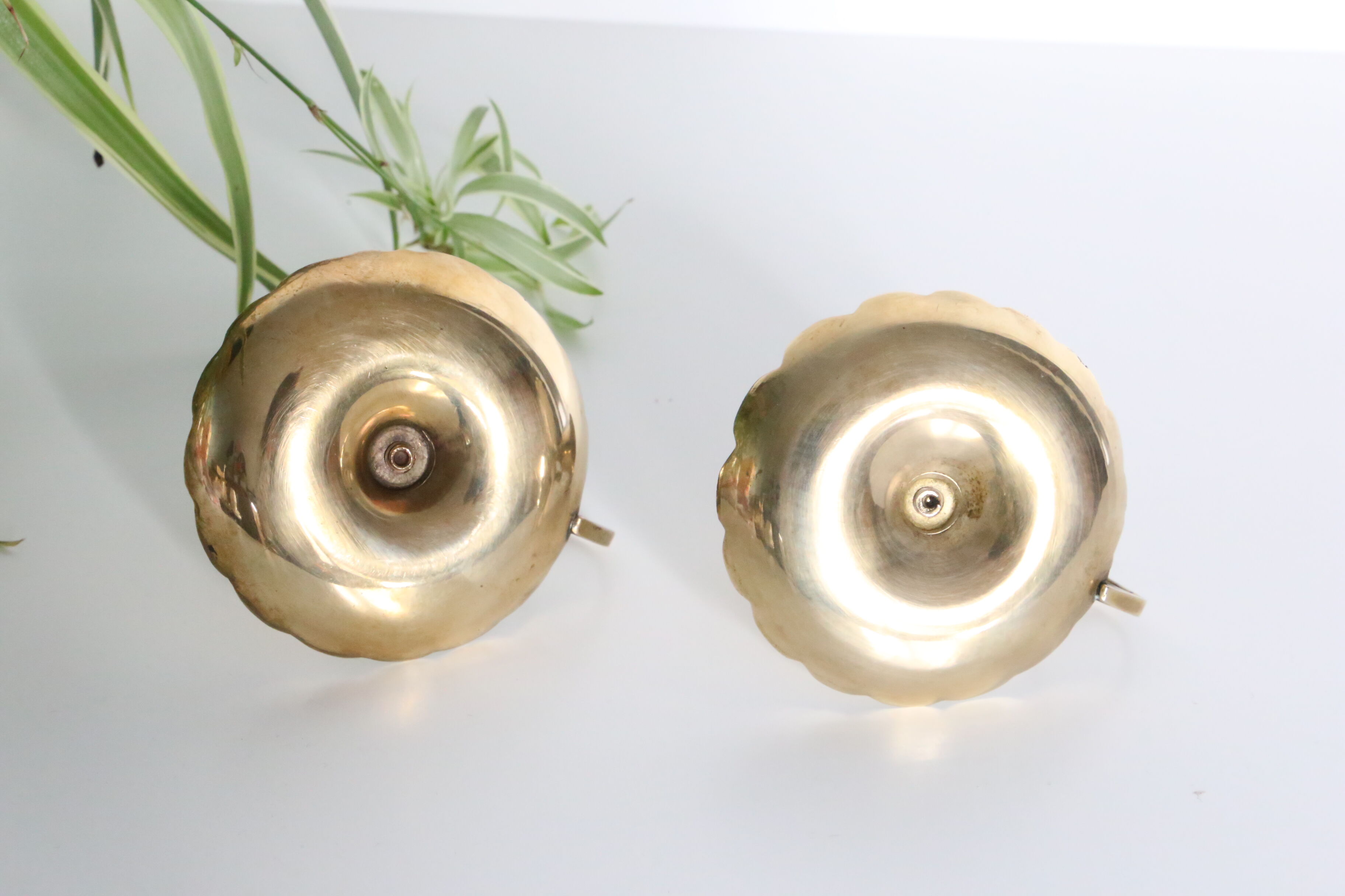 Duo of rat candlesticks in gilded brass