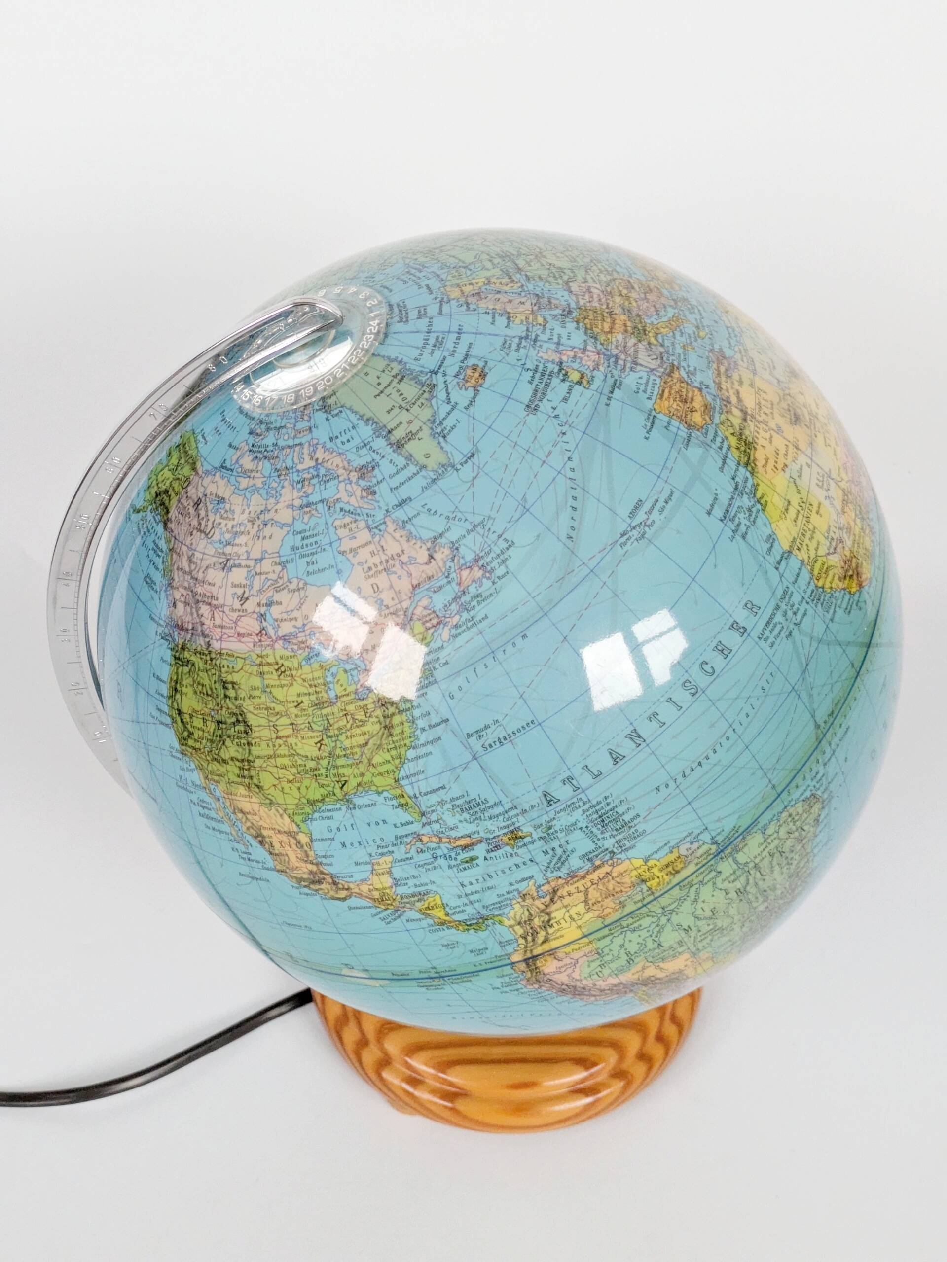 Columbus Duplex illuminated globe on a wooden base, 1980s