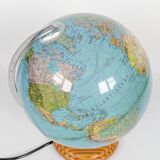 Columbus Duplex illuminated globe on a wooden base, 1980s