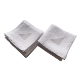 18 antique napkins in white linen with an embroidered geometric decoration