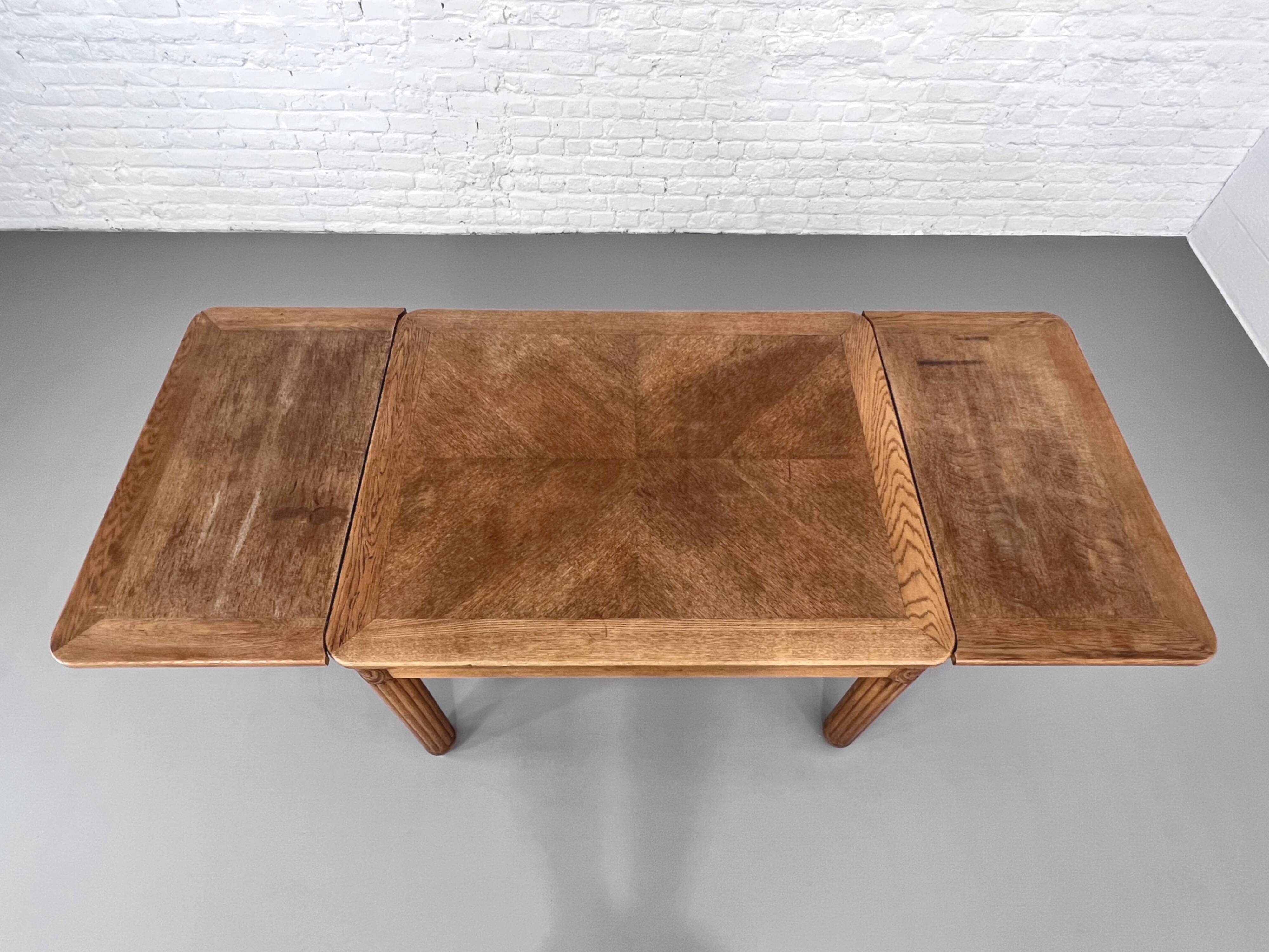 Rectangular dining table in oak and extendable early twentieth century