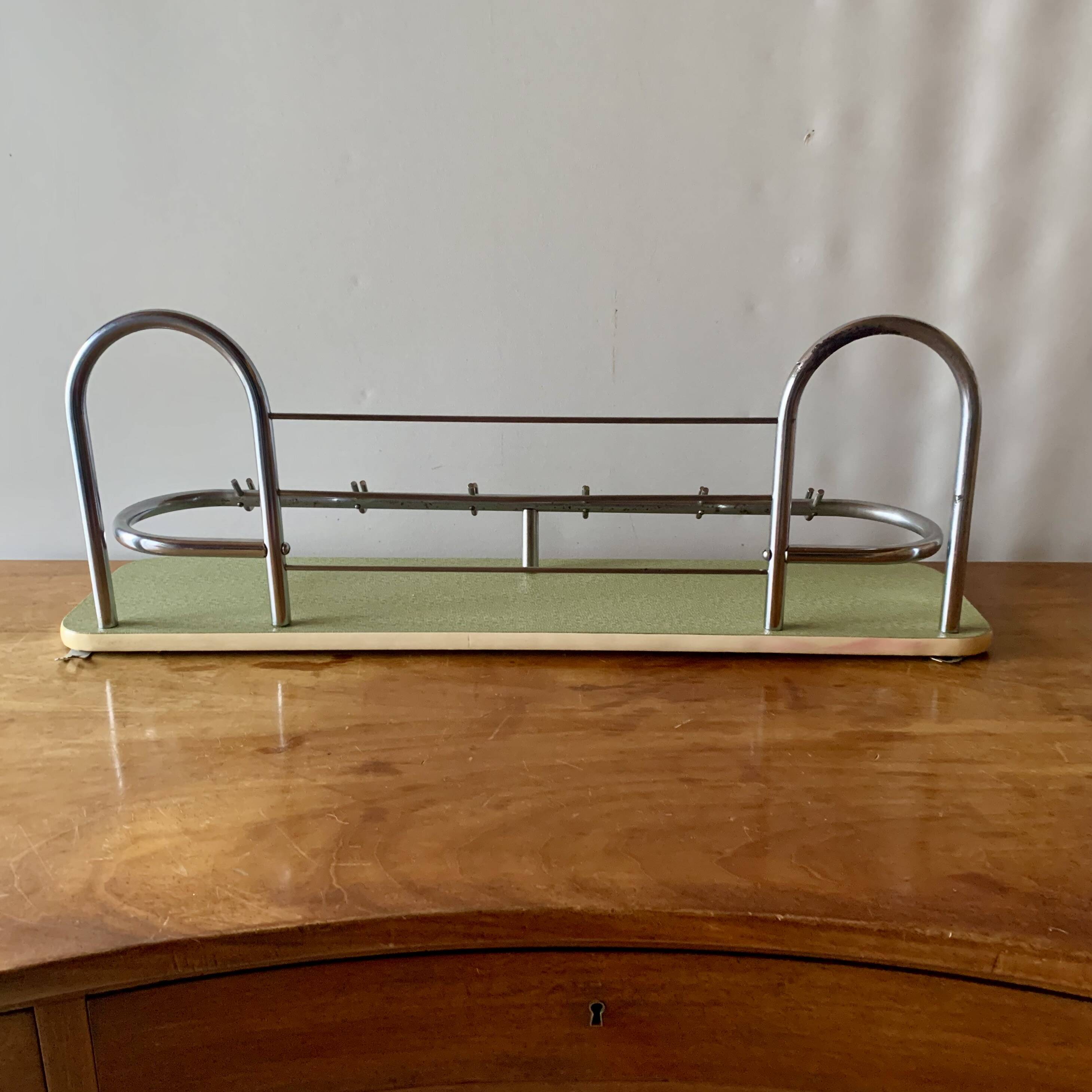 Large vintage wall-mounted coat rack in green Formica and chrome metal