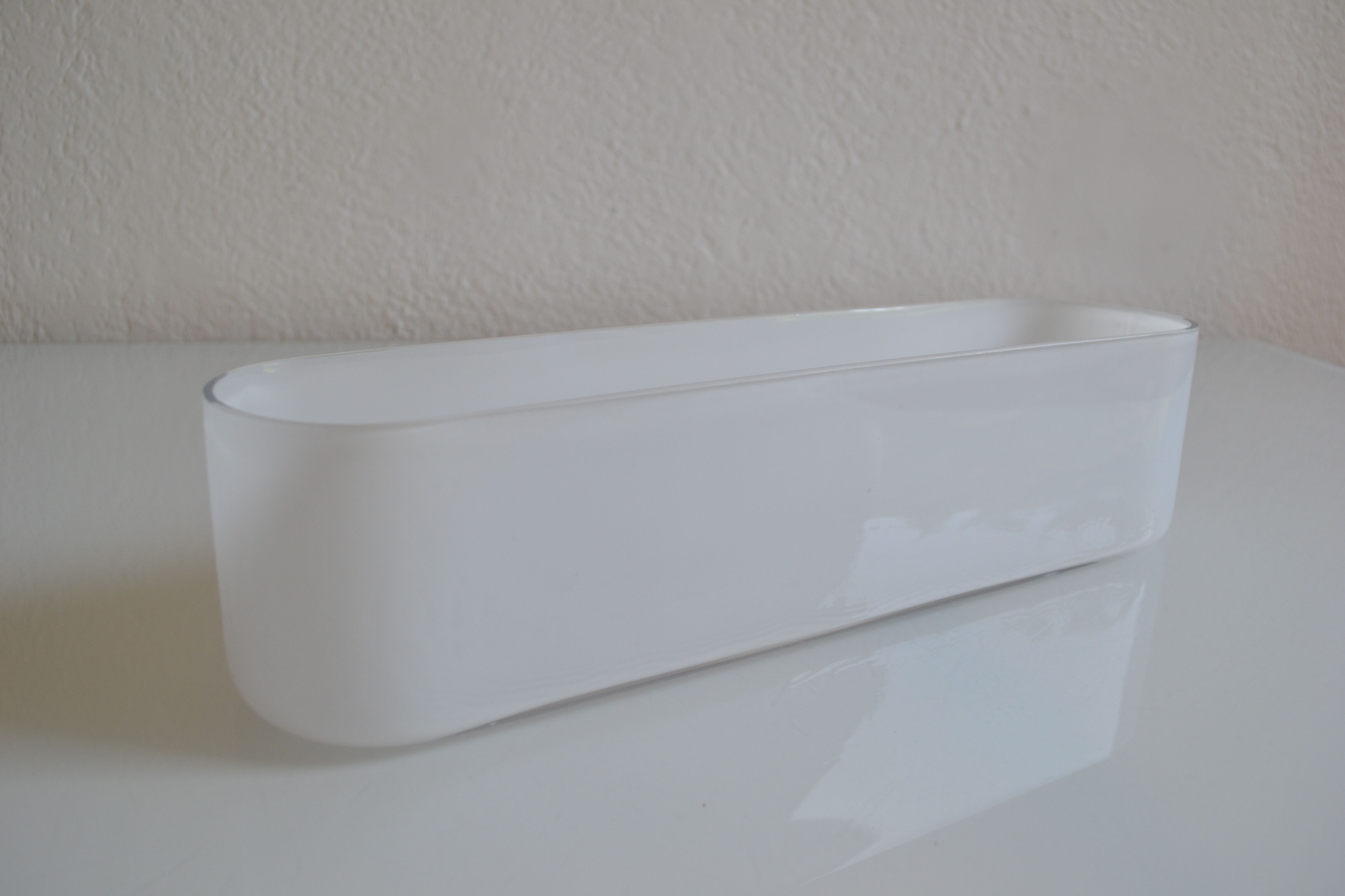 Modernist vase or centerpiece in white glass