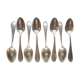 8 teaspoons made of silver metal