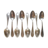 8 teaspoons made of silver metal