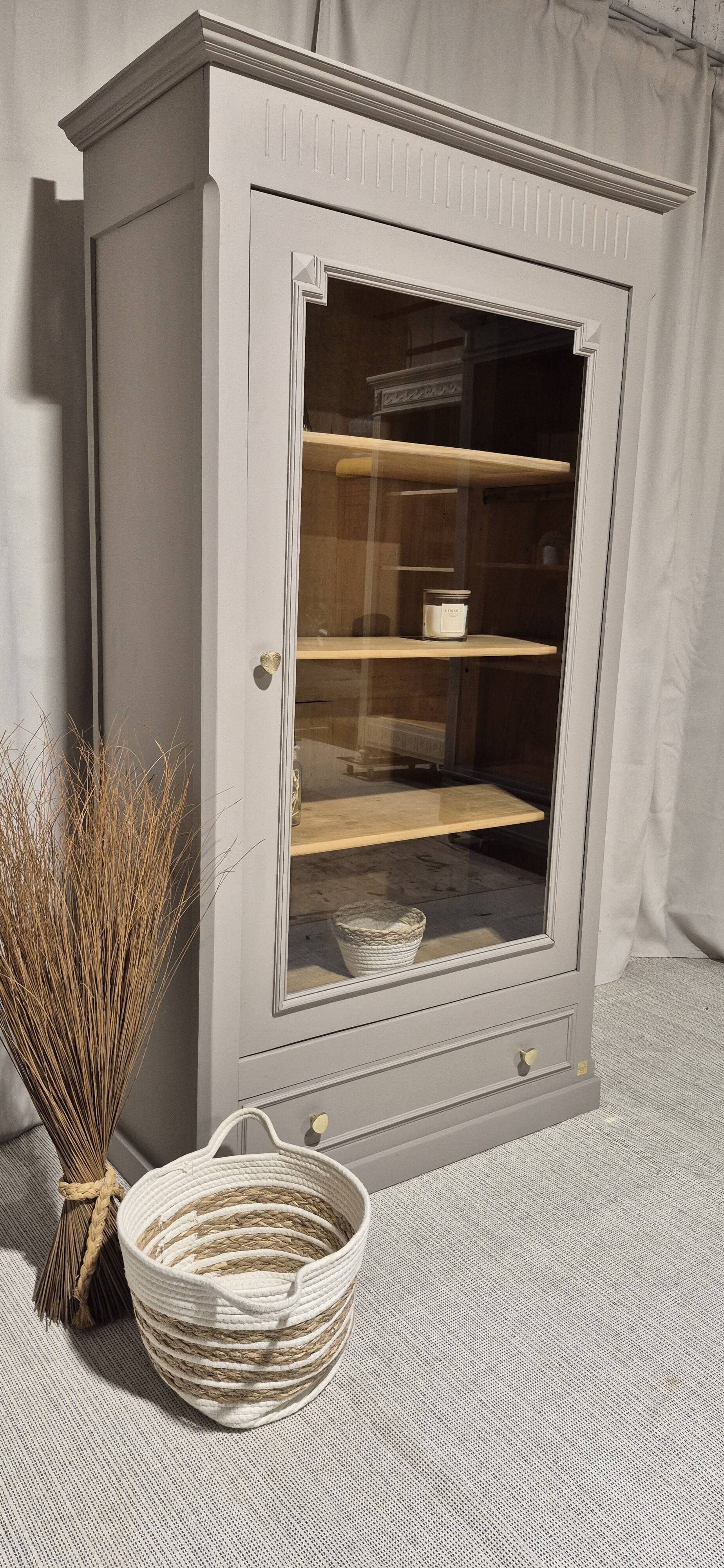 Glass display cabinet with drawer