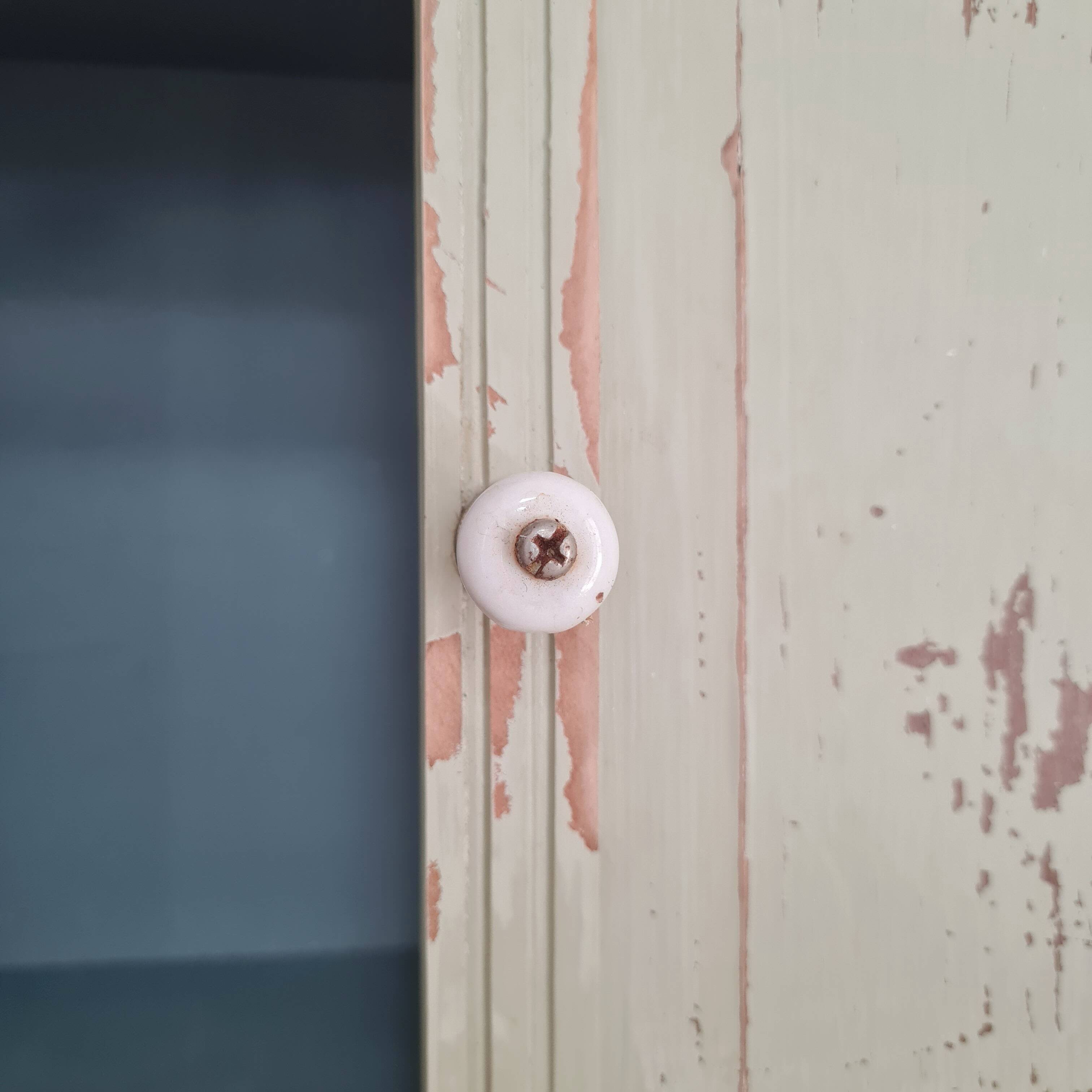 Small old wall shelf with sliding doors