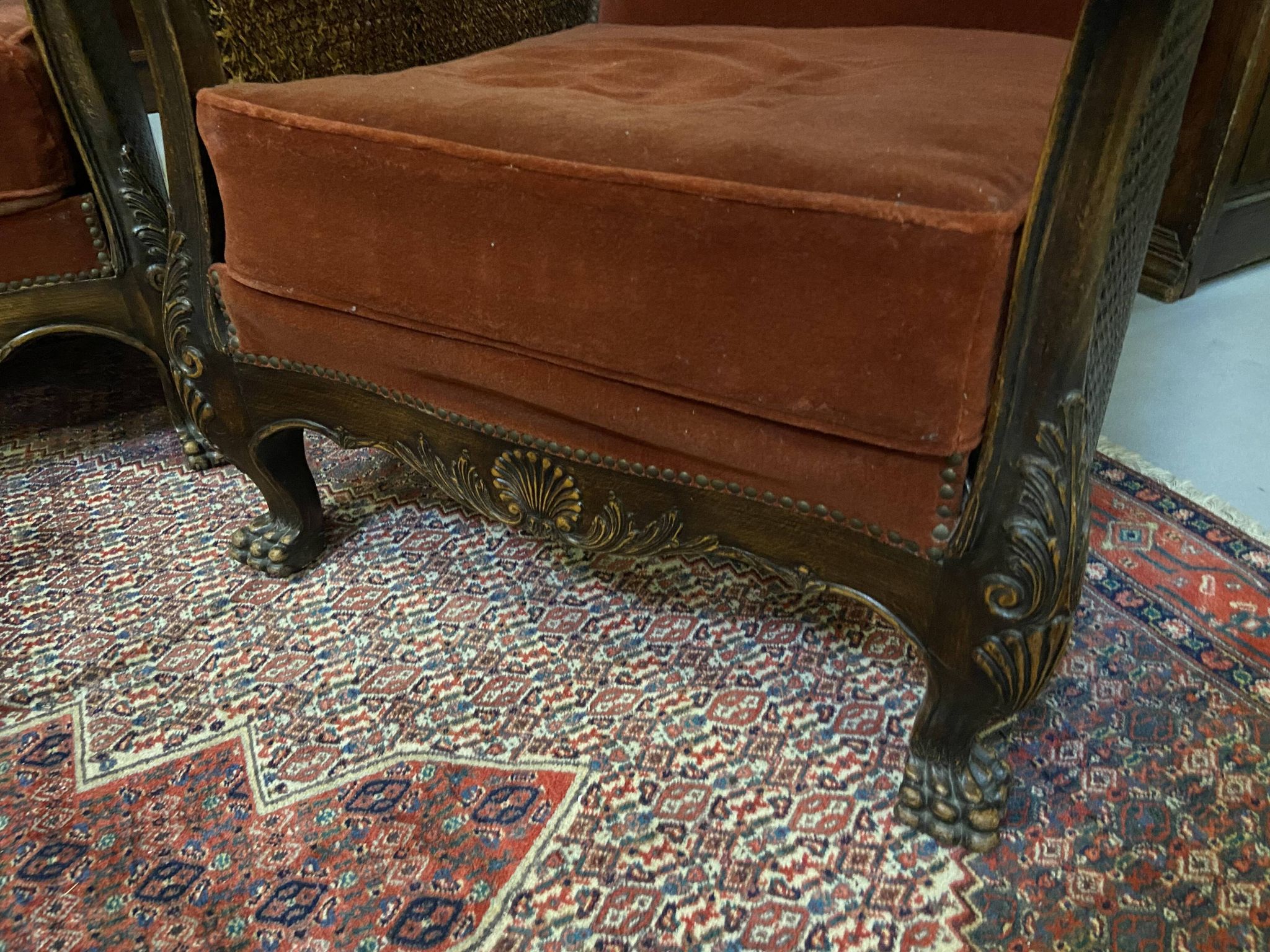 Baroque living room in burgundy velvet and wood