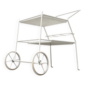 Mid-century modern minimalist perforated metal bar cart from the 1960s.