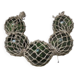 5 old glass fishing floats with rope net