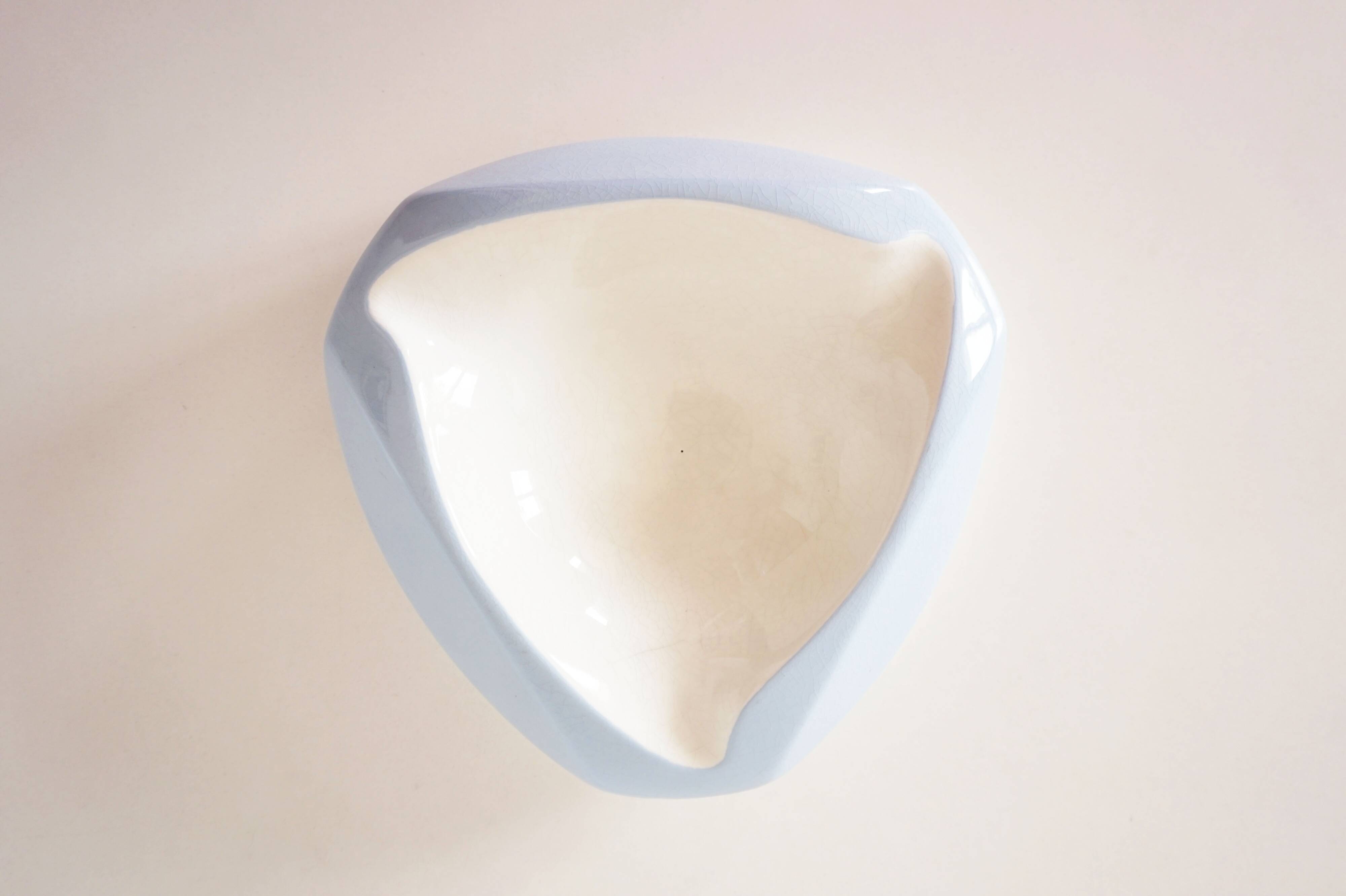 Large white and sky blue ceramic catchall from the 1950s.