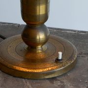 Art Deco table lamp in patinated brass from the 1940s.