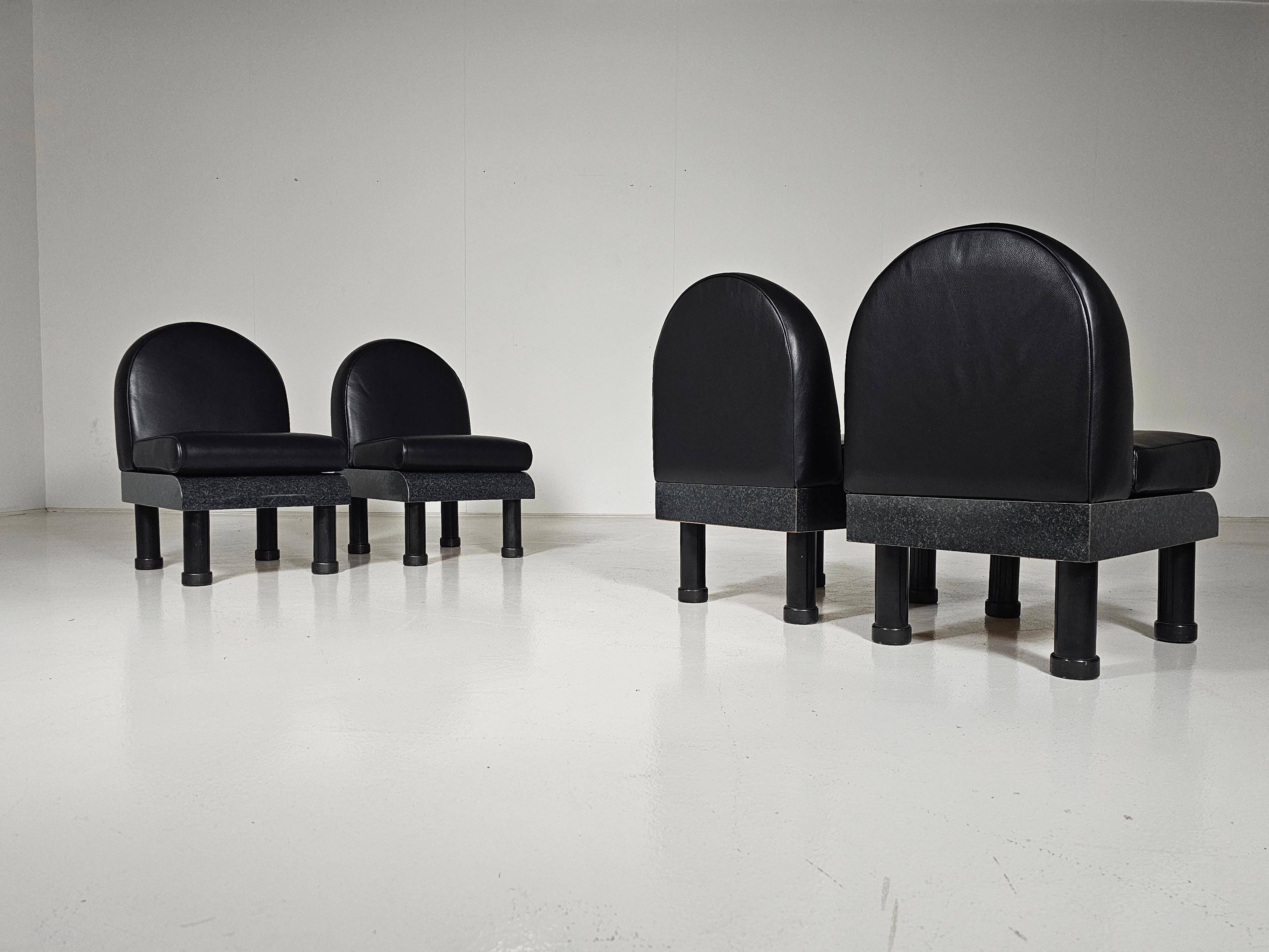 Black leather loungers , 1980.