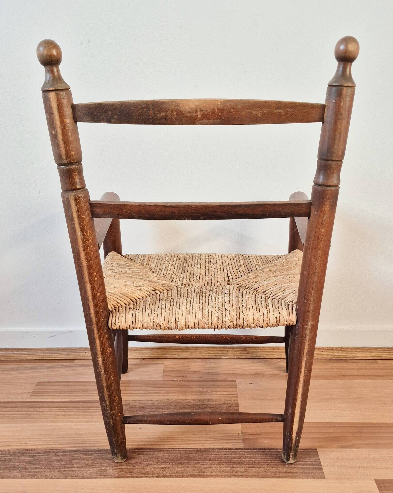Vintage wooden and straw children's armchair, 1950s.