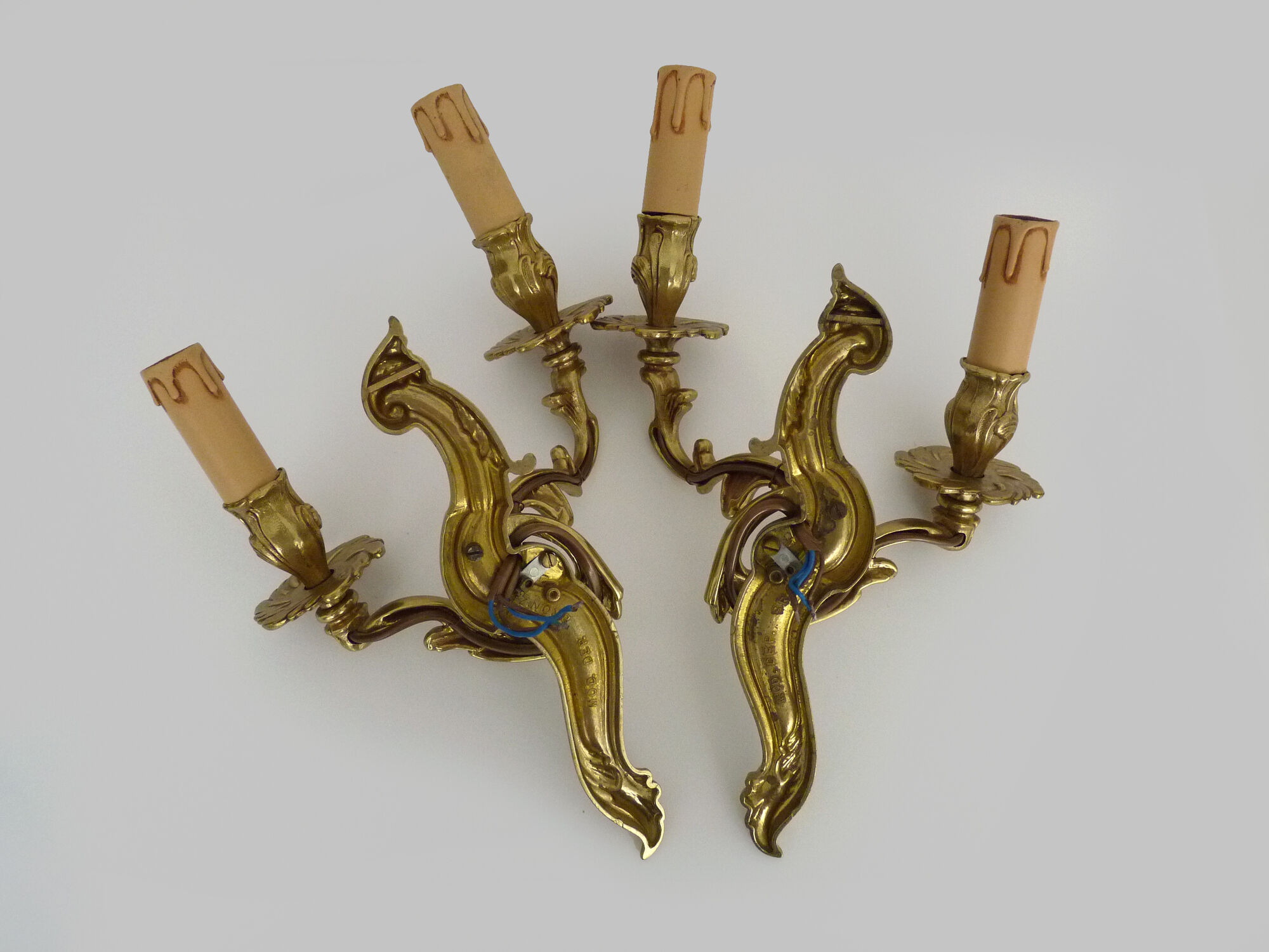 Old pair of wall sconces with double fires in bronze, 50s