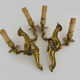 Old pair of wall sconces with double fires in bronze, 50s