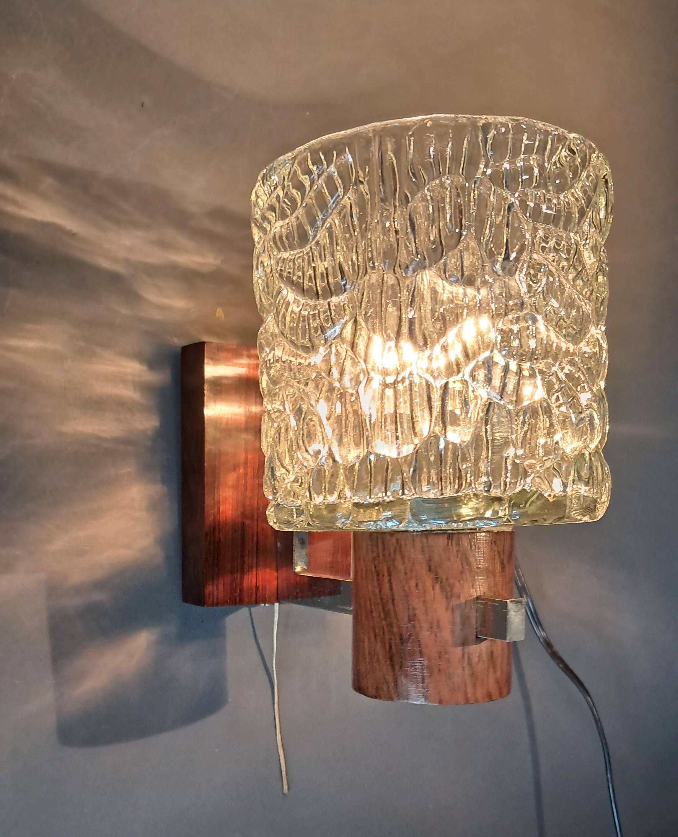 Scandinavian teak and chrome wall light from the 1960s.
