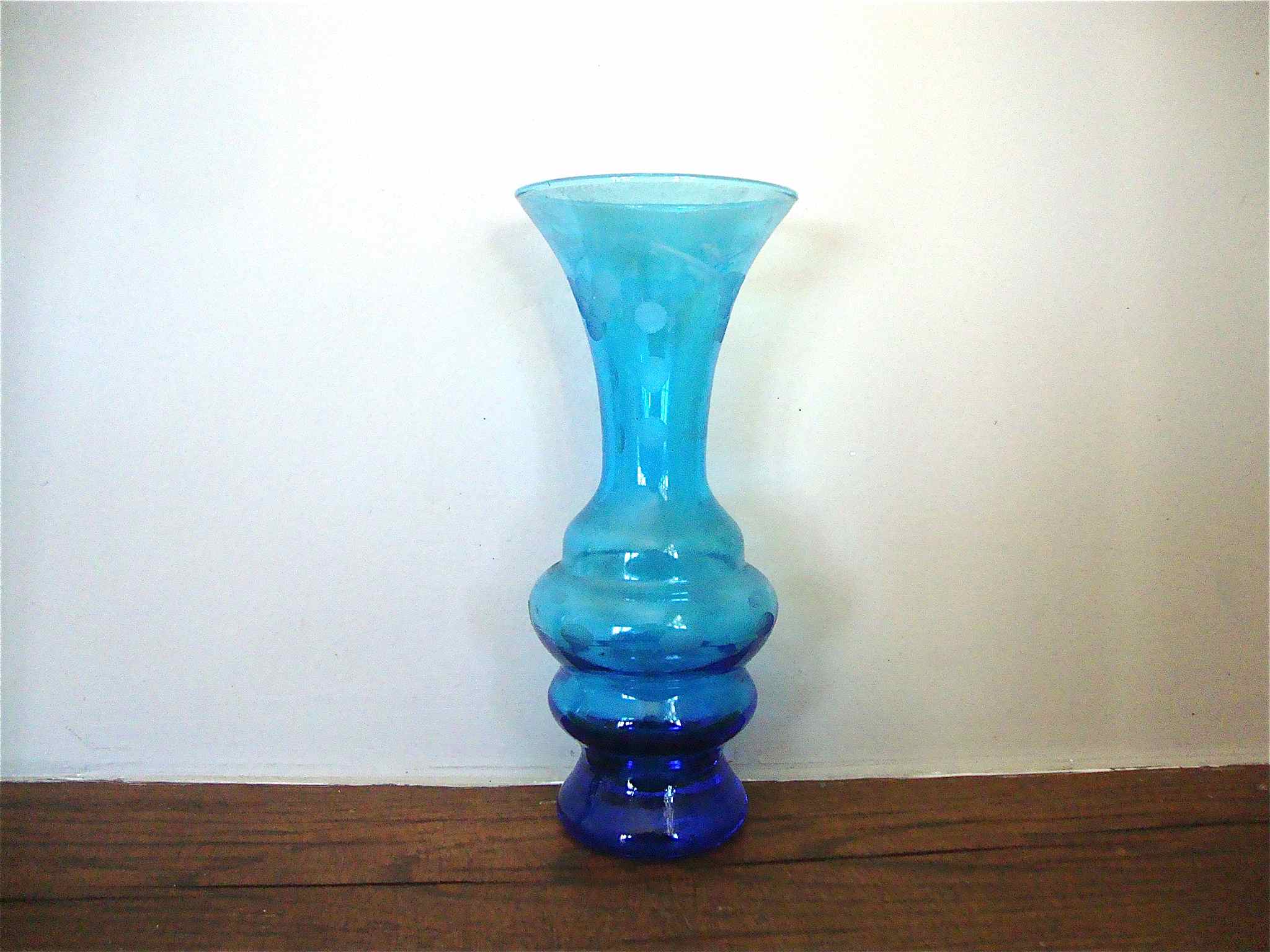 Ancient vase in engraved glass