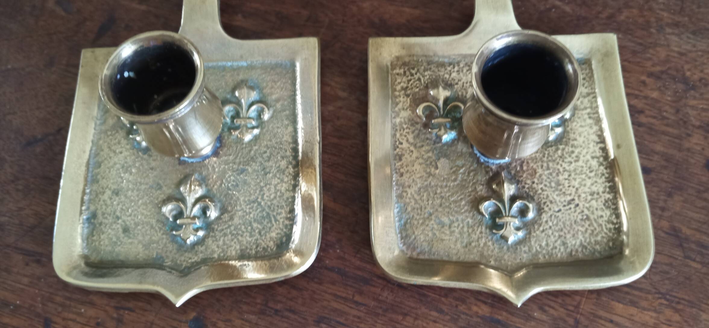 Pair of bronze candlesticks, fleur-de-lis