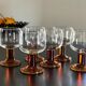 6 Amber stemmed glasses an'70