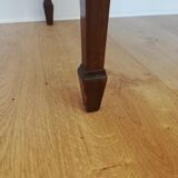 English wooden desk on top of leather