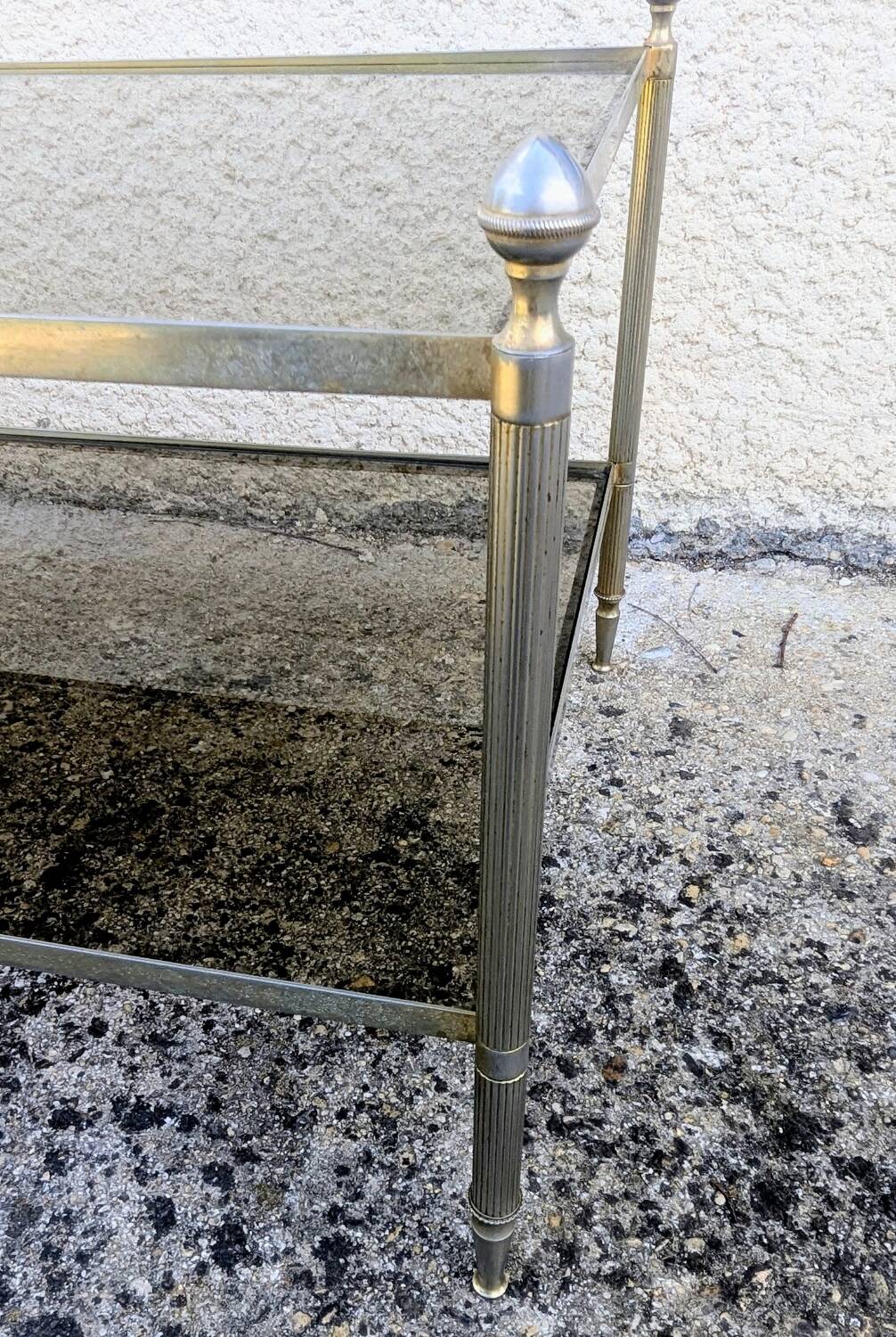 Vintage coffee table with gold metal and smoked glass, featuring 2 tiers in Hollywood style.