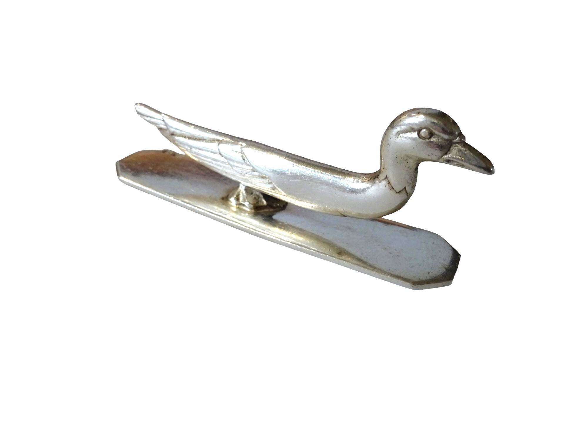 12 Art Deco animal knife holders in silvered bronze