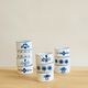 Set of 10 rounds of enamelled metal towel