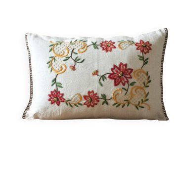 Large hand-embroidered linen cushion.