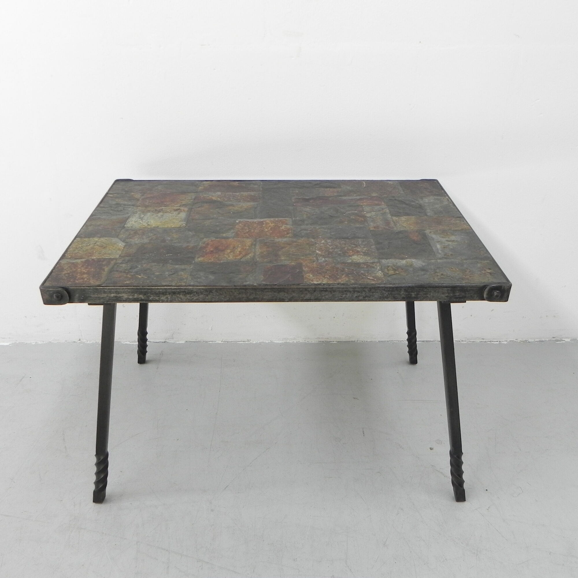 Brutalist coffee table with slate top