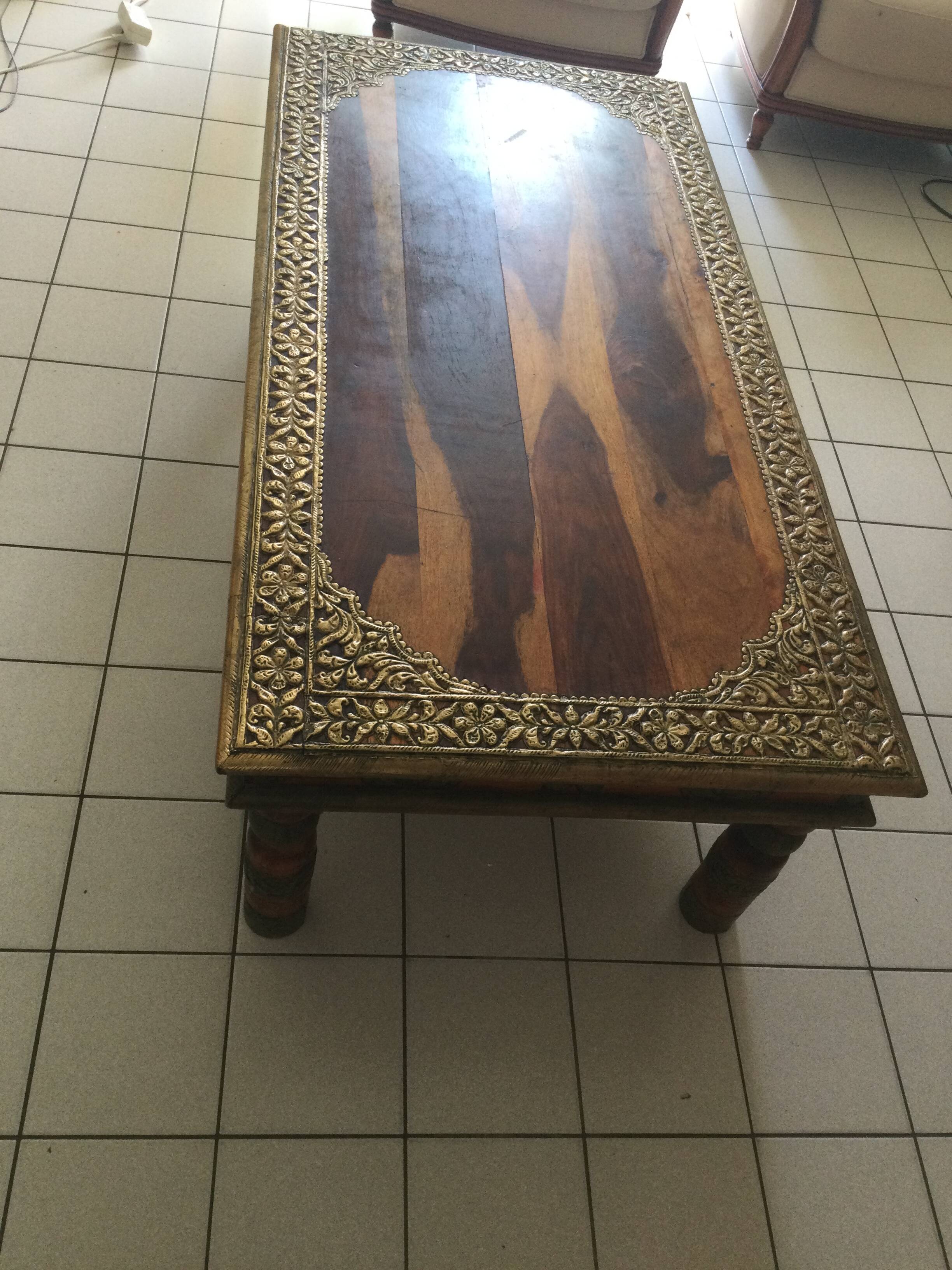 Large vintage Indian coffee table made of solid sheesham wood and brass.