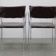 Ensemble de six fauteuils en cuir italien et chrome par Arper.
