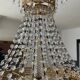 Brass hot air balloon chandelier with cascade of tassels